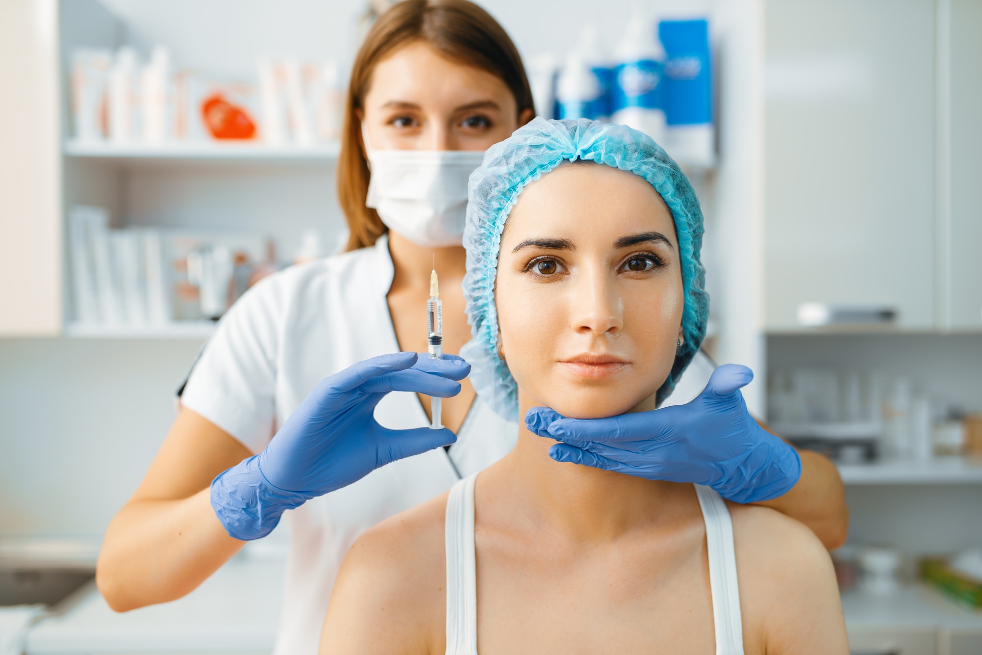 cosmetician-holds-syringe-with-injection-of-botox.jpg cosmetician-holds-syringe-with-injection-of-botox.jpg